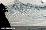 Исследователи обнаружили удивительно сильный восходящий поток тепла от геотермальных источников под азпадным антарктическим ледниковым щитом. File photo by UPI/ NASA